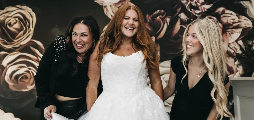 Models wearing a black dresses