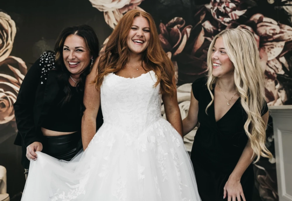 Models wearing a black dresses. Mobile image